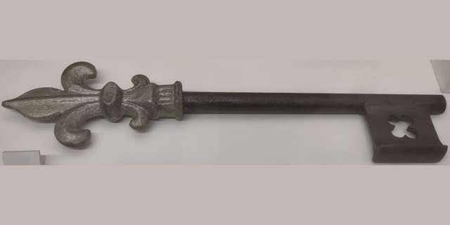 The key to Lidice. A slightly ornate, old-fashioned looking key.